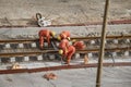 Tel Aviv, Israel - May 20 2021: Construction Workers with Orange overalls. Light rail tracks. blue collar worker