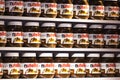 Background with cans of chocolate nutty pasta Nutella attractions of the city Market Sarona . Royalty Free Stock Photo