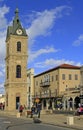 People walk at Clock Tower on Yefet street in Jaffa