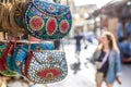 Tel Aviv, Israel - Oct 26th 2018 - Tourists attracted by local itens in a local market in a late afternoon light in Tel Aviv,