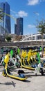 TEL AVIV, ISRAEL - October 09, 2021: Downtown view from Yigal Alon Street. Parking of bicycles, bikes and rental electric scooters