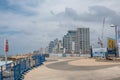 Tel Aviv, Israel. View from the promenade with ocean and beach view to the famous Dan Panorama Hotel and modern skyscrapers Royalty Free Stock Photo