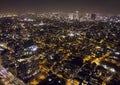 Tel Aviv night scene, panoramic view of central districts of Tel-Aviv at dark night. Megalopolis life after sunset. Night life in