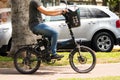 Unidentified Man riding an electric bicycle