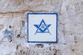 Tel Aviv-Yafo, Israel - December 19, 2021: Freemason emblem on the old ruined wall