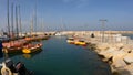 Tel Aviv-Yafo, Israel - November 15, 2021: Street scene in the early evening at Jaffa old city harbor with people and