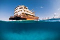 Telamon wreck ship in blue ocean. Split view. Lanzarote