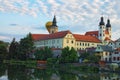 TELC, THE CZECH REPUBLIC-AUGUST 26, 2017: One hot air balloon appeared behind the tower. Sky with sunrise.