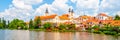 Telc Panorama. Water reflection of houses and Telc Castle, Czech Republic. UNESCO World Heritage Site