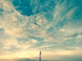Communication tower alone in open sky Royalty Free Stock Photo