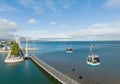 Telecabine Lisboa at Park of Nations. Vasco da Gama tower and Bridge in Lisbon. Cable car in the modern district of Lisbon over