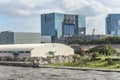 The Telecom Center glass covered arch building adjacent to Telecom Center Station in the bayside area of Odaiba in Tokyo, Japan.