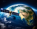 telecom communication satellite orbiting around the earth.