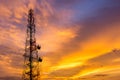 Telecom tower with golden sky at twilight time Royalty Free Stock Photo