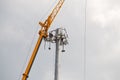 Telecom tower install communication equipment for sent signal to the city, satellite dish telecom network in the city Royalty Free Stock Photo