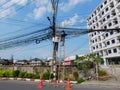 Telecom workers on two ladders