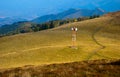 Telecommunication antenna (GSM) on mountain meadow Royalty Free Stock Photo