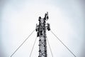 Telecommunication engineer working on high tower,Risk work of high work,Technician working with safety equipment on