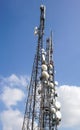 Telecommunication mast TV antennas wireless technology with blue sky in the morning Royalty Free Stock Photo