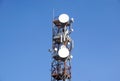 Telecommunication mast TV antennas wireless technology with blue sky in the morning Royalty Free Stock Photo