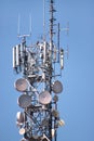 Telecommunication network repeaters, base transceiver station. Tower wireless communication antenna transmitter and repeater. Royalty Free Stock Photo