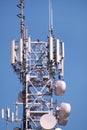 Telecommunication network repeaters, base transceiver station. Tower wireless communication antenna transmitter and repeater. Royalty Free Stock Photo