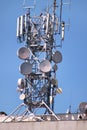 Telecommunication network repeaters, base transceiver station. Tower wireless communication antenna transmitter and repeater. Royalty Free Stock Photo