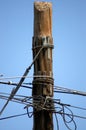 Telecommunication pole full of various cables