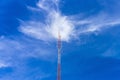 Telecommunication radio wave signal tower red and white with cloudy. Steel truss of transmission signal antenna with blue sky. Royalty Free Stock Photo