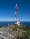 Telecommunication tower with antennas and blue sky background at Pico do Facho hill viewpoint, Machico, Madeira Royalty Free Stock Photo