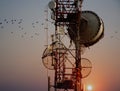 Telecommunication tower Antennas with sunset
