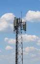 Telecommunication tower on blue sky background Royalty Free Stock Photo