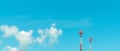 Telecommunication tower with blue sky and white clouds. Radio and satellite pole. Communication technology. Telecommunication
