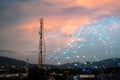 Telecommunication Tower for 2G 3G 4G 5G network during sunset. Antenna, BTS, microwave, repeater, base station, IOT. Technology