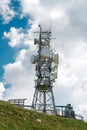 Telecommunication tower with many antennas and repeaters