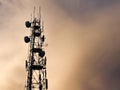 Telecommunication tower with cloudy background