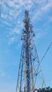Telecommunication tower with sky background in Bogor, Indonesia. Royalty Free Stock Photo