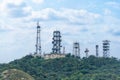 Telecommunication tower with telecom broadcasting antenna on mountain Royalty Free Stock Photo