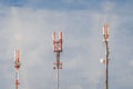 Telecommunication towers of mobile and cellular communication antennas on the background of the sky Royalty Free Stock Photo