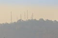 Telecommunication towers on the summit of the hill Royalty Free Stock Photo