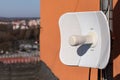 Telecommunications antenna mounted on the building's sewing, used for data transmission in cellular networks and