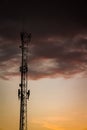 Telecommunications antenna during sunset. Cellular technology