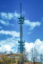 Telecommunications antenna tower for mobile phone with the blue sky background Royalty Free Stock Photo