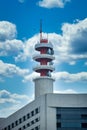 Telecommunications antenna tower for mobile phone with the blue sky background Royalty Free Stock Photo