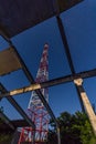 Telecommunications tower of abandoned structures against night stars Royalty Free Stock Photo