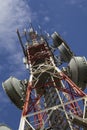 Telecommunications tower against blue sky Royalty Free Stock Photo