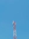The telecommunications tower functions for communication via internet network with a blue sky background Royalty Free Stock Photo