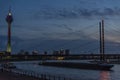 Telecommunications tower and the Oberkassel bridge at night in G Royalty Free Stock Photo