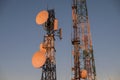 Telecommunications tower at sunrise and blue sky Royalty Free Stock Photo