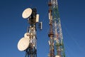 Telecommunications tower at sunrise and blue sky Royalty Free Stock Photo